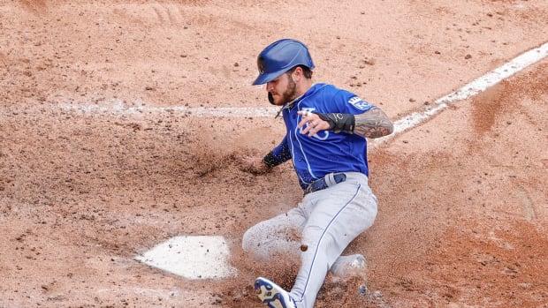 Apr 11, 2021; Chicago, Illinois, USA; Kansas City Royals center fielder Kyle Isbel (28) scores against the Chicago White Sox during the fifth inning at Guaranteed Rate Field. Mandatory Credit: Kamil Krzaczynski-USA TODAY Sports